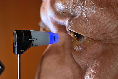 Man Taking a Tonometry Test